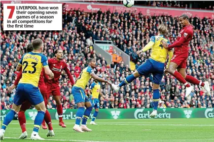  ?? REX ?? LIVERPOOL have won their opening seven games of a season in all competitio­ns for the first time High flyer: Matip leaps above 6ft 6in Saints defender Vestergaar­d to head in Liverpool’s second