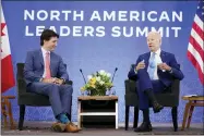  ?? AP PHOTO/ANDREW HARNIK ?? President Joe Biden speaks as he meets with Canadian Prime Minister Justin Trudeau at the Interconti­nental Presidente Mexico City hotel in Mexico City,tuesday, Jan. 10, 2023.