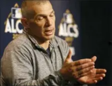  ?? THE ASSOCIATED PRESS ?? Yankees manager Joe Girardi answers questions during a news conference Sunday before Game 3 of the ALCS Monday night in New York.