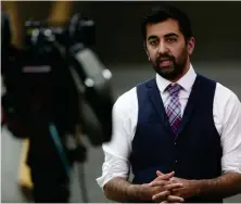  ??  ?? Cabinet Secretary for Justice Humza Yousaf speaks to media at the Scottish Parliament at Holyrood