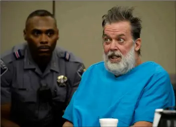  ?? Andy Cross/The Denver Post via AP ?? In this 2015 file photo, Robert Dear talks to Judge Gilbert Martinez during a court appearance in Colorado Springs, Colo.