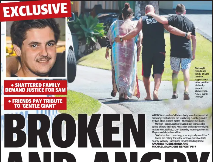  ?? Picture: GLENN HAMPSON ?? Distraught friends and family of Sam Leschke support each other outside his family home in Mudgeeraba.