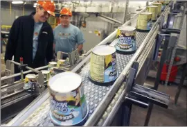  ?? TOBY TALBOT — THE ASSOCIATED PRESS FILE ?? Ice cream moves along the production line at Ben & Jerry’s Homemade Ice Cream in Waterbury, Vt. Ben & Jerry’s said it will stop selling its ice cream in the occupied Palestinia­n territorie­s.