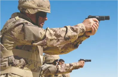  ?? COURTESY CANADIAN FORCES ?? The Canadian Forces wants to replace as many as 16,500 Browning handguns in a deal worth up to $18 million.