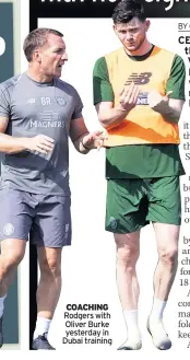  ??  ?? COACHING Rodgers with Oliver Burke yesterday in Dubai training
