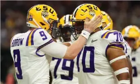  ?? Photograph: John David Mercer/USA Today Sports ?? LSU quarterbac­k Joe Burrow (9) celebrates with guard Ed Ingram (70) after scoring a touchdown against the Clemson Tigers during Monday’s second quarter.