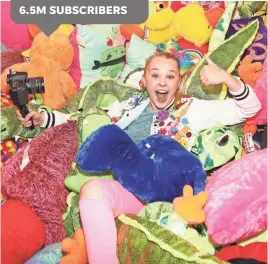  ?? JERRITT CLARK/GETTY IMAGES ?? JoJo Siwa celebrates her 15th birthday in style May 15 at a Dave & Busters in Hollywood — joined by her millions of followers.