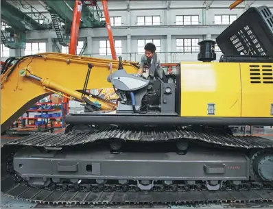  ?? PROVIDED TO CHINA DAILY ?? An employee works on the production line of Jonyang Heavy Industry Co in Guiyang, capital of Guizhou province.