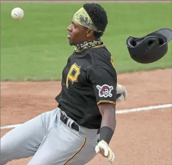  ?? Matt Freed/Post-Gazette ?? Third baseman Ke’Bryan Hayes heads to third base with a triple Sunday against the Boston Red Sox at JetBlue Park in Fort Myers Fla.