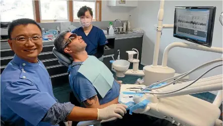  ??  ?? Principal dentist Dr Mike Che from Manukau Road Dental is highly experience­d and loves helping patients achieve great smiles.