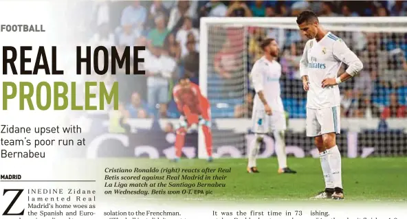  ?? EPA pic ?? Cristiano Ronaldo (right) reacts after Real Betis scored against Real Madrid in their La Liga match at the Santiago Bernabeu on Wednesday. Betis won 0-1.