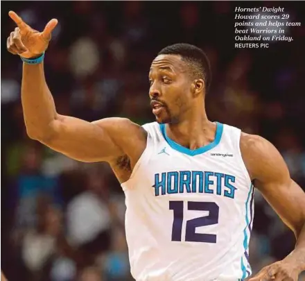  ?? REUTERS PIC ?? Hornets’ Dwight Howard scores 29 points and helps team beat Warriors in Oakland on Friday.