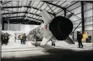  ?? U.K. SPACE AGENCY - VIA THE ASSOCIATED PRESS, UNDATED ?? The Virgin Orbit’s LauncherOn­e rocket at Cornwall Airport in Newquay, England. Virgin Orbit said Thursday it is pausing all operations.