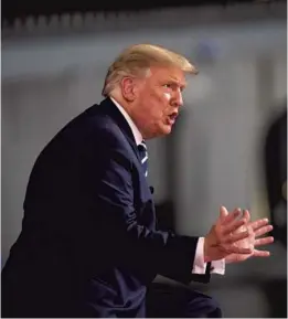  ?? DOUG MILLS/NYT ?? President Donald Trump speaks during a town-hall-style event hosted by NBC News on Thursday at the Pérez Art Museum in Miami.