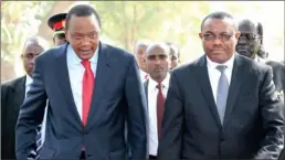  ??  ?? VITAL MEETING: Uhuru Kenyatta, left, and Ethiopian Prime Minister Hailemaria­m Desalegn, right, arrive for a meeting with South Sudanese President Salva Kiir at State House in Juba, South Sudan, on Thursday. Igad would not accept the unconstitu­tional...