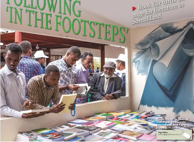  ?? Photo: AFP ?? People browse for books on Saturday at the Hargeisa Internatio­nal Book Fair in Hargeisa.