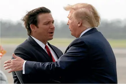  ?? AP ?? They were once good friends,
but Donald Trump now sees
Florida Governor Ron DeSantis, left, as his main rival for the Republican nomination for
the 2024 presidenti­al election.