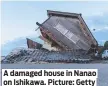  ?? ?? A damaged house in Nanao on Ishikawa. Picture: Getty