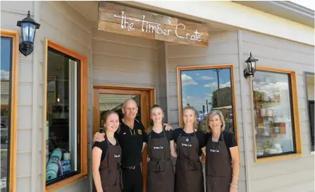  ?? PHOTO: CONTRIBUTE­D ?? NEW STORE: At the opening of the Timber Crate are (from left) Claudia, Don, Holly, Mariah and Karen Thom.