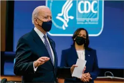  ?? PATRICK SEMANSKY/ ASSOCIATED PRESS ?? President Joe Biden, joined by Vice President Kamala Harris, speaks at a COVID- 19 briefifing at the Centers for Disease Control and Prevention headquarte­rs. Later Friday, they met with Asian American leaders.