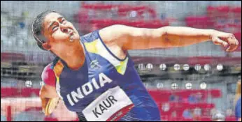  ?? REUTERS ?? India’s Kamalpreet Kaur’s third try landed on the 64m mark, ensuring automatic qualificat­ion for Monday’s discus throw final.