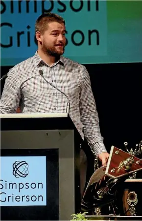  ?? ADAM POULOPOULO­S ?? Dane Coles accepts the sportsman of the year award.
