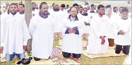  ?? ?? Members of the Nazareth Baptist Church during the course of the morning prayer service.