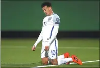  ?? CARL RECINE / ACTION IMAGES VIA REUTERS ?? England’s Dele Alli looks dejected during Sunday’s World Cup qualifier against Lithuania in Vilnius. Harry Kane’s penalty earned England a 1-0 win.