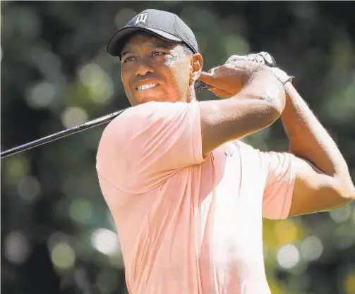  ??  ?? Tiger Woods continues his impressive comeback by tying for first-round lead in season-ending FedEx Cup Tour Championsh­ip.