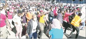  ?? ( File pics) ?? Marchers came in their numbers on Thursday with the hope of attending the bail hearing of MPs Mduduzi Bacede Mabuza and Mthandeni Dube.