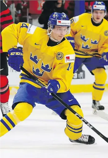  ?? KEVIN HOFFMAN/GETTY IMAGES ?? Elias Pettersson had a season filled with accomplish­ments playing in Sweden and for his national team. Now he’s ready to try out his skill against the best players in the world at the NHL level.