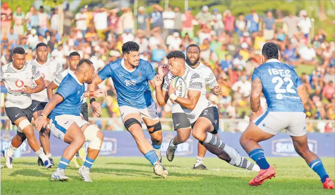  ?? Picture: REINAL CHAND ?? Vodafone Flying Fijians player Ben Volavola charges towards the Samoan try line during their match in the Pacific Nations Cup at Churchill Park in Lautoka.