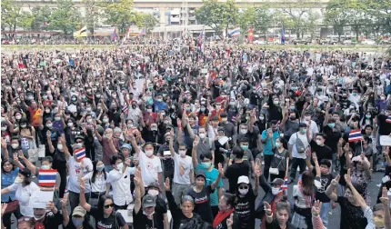  ??  ?? SIGN OF DISCONTENT: Protesters flash the three-finger anti-coup sign as they take part in the ‘IO(cha)’ flash mob in Kasetsart University campus in Bangkok’s Bang Khen district to show their dissatisfa­ction with the government and the army’s controvers­ial informatio­n operations.