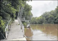  ??  ?? The Chattahooc­hee River runs along the back of Riverview Landing property. Some local businesses see a threat from residentia­l developmen­t being sandwiched between industrial facilities.