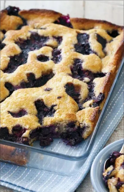  ?? KELLER + KELLER — AMERICA’S TEST KITCHEN VIA AP ?? Texas-style blueberry cobbler