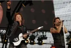  ?? JASON DECROW/THE ASSOCIATED PRESS FILE PHOTO ?? Jon Bon Jovi, right, and bandmate at the time Richie Sambora perform with Bon Jovi in 2008. The band led Rock Hall fan voting with 1.16 million votes.
