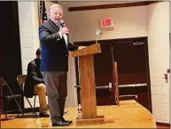  ?? Vivian Santos / Danbury Public Schools ?? Mayor Dean Esposito addresses the graduating Class of 2022 from the Alternativ­e Center for Excellence in Danbury in a ceremony recently in the auditorium at Broadview Middle School.