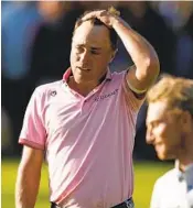  ?? SUE OGROCKI AP ?? Justin Thomas reacts after winning the PGA Championsh­ip in a playoff against Will Zalatoris (right).