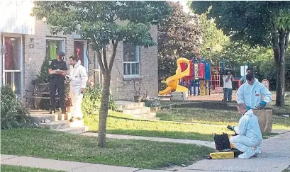  ?? CLAIRE FLOODY/TORONTO STAR ?? Peel police officers remained throughout the day at the home on McHardy Court where a 5-year-old boy went missing Thursday.