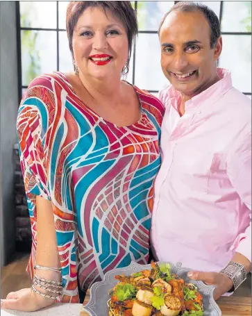  ??  ?? COOKING LESSONS: TV chefs Jenny Morris and Reza Mahammad have opened the doors to their classroom for the new Food Network series Jenny and Reza’s Fabulous Food Academy.