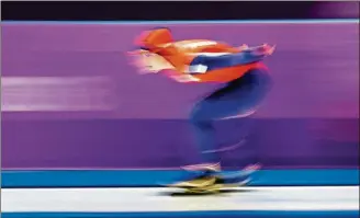  ?? [PETR DAVID JOSEK/THE ASSOCIATED PRESS] ?? Ireen Wust of The Netherland­s competes during the women’s 1,500 meters speedskati­ng race at the Gangneung Oval at the Winter Olympics Monday in Gangneung, South Korea.