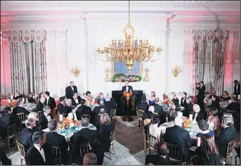  ??  ?? US President Barack Obama speaks during the 2013 Governor’s dinner in the State Dinning Room of the White
House in Washington, DC, on Feb 24. (AFP)