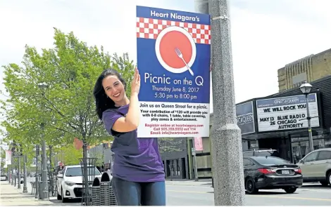  ?? RAY SPITERI/NIAGARA FALLS REVIEW ?? Vanessa Raso, project developmen­t officer for Heart Niagara, is getting ready for the Picnic on the Q event scheduled for June 8 on Queen Street in downtown Niagara Falls.