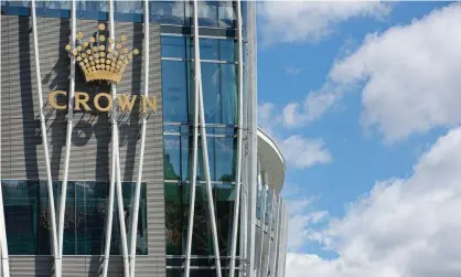  ?? Photograph: Jessica Hromas/The Guardian ?? The Crown casino tower at Barangaroo in Sydney. The troubled gambling company may merge with rival group Star Entertainm­ent.