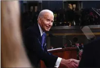  ?? SHAWN THEW — POOL VIA AP ?? President Joe Biden shakes hands after delivering the State of the Union address to a joint session of Congress at the Capitol, Thursday, March 7, 2024, in Washington.