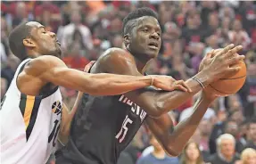  ?? THOMAS B. SHEA/USA TODAY ?? A restricted free agent, Clint Capela, right, can sign an offer sheet with another team, but the Rockets can match the deal and keep him.