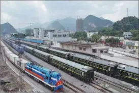  ?? HUANG QI / FOR CHINA DAILY ?? The first freight train carrying imported fruit from ASEAN markets to China after the Regional Comprehens­ive Economic Partnershi­p agreement took effect this year arrives in Pingxiang, Guangxi Zhuang autonomous region, in January.