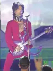  ?? MILWAUKEE JOURNAL SENTINEL ?? Prince performs at the Marcus Amphitheat­er on June 28, 2001.