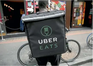  ?? PHOTO: REUTERS ?? There are now 190 restaurant­s delivering via UberEats in Auckland, up from 70 when it launched.