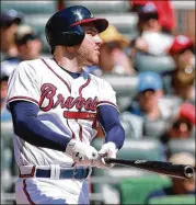  ?? CURTIS COMPTON / CCOMPTON@AJC.COM ?? “Nice to know what winning feels like again,” says Braves first baseman Freddie Freeman after going 3 for 3 with a walk and three RBIs.